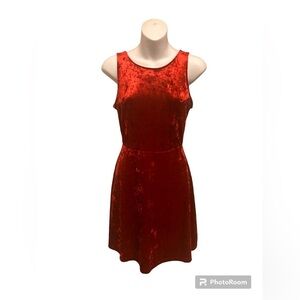 Divided Red velvet like women’s dress. Size 6. New without tags.
